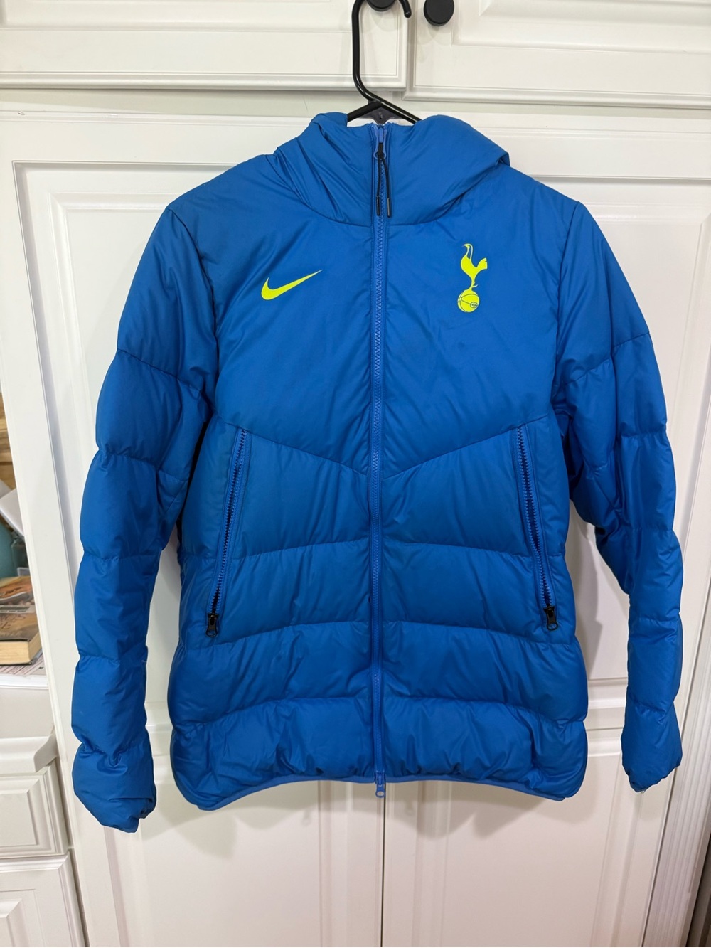 Nike women’s Tottenham Blue Puffer Jacket with Neon Yellow Logos